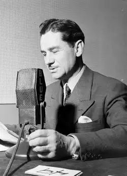 Lowell Thomas at microphone